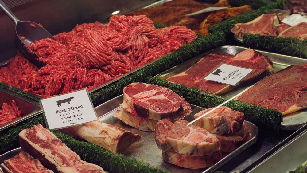 Shelf in a European supermarket displaying all types of raw Brazilian beef products