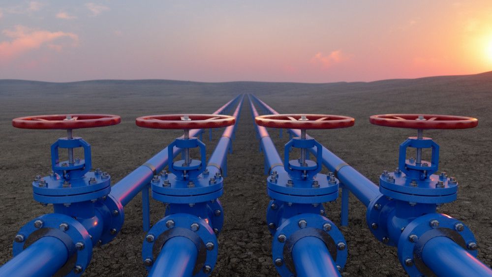 Four blue gas pipes in open field connecting African countries and Europe through a new trade agreement.
