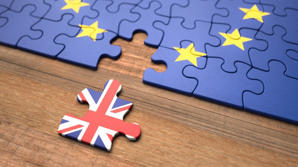 UK flag separated from the EU in form of puzzle game